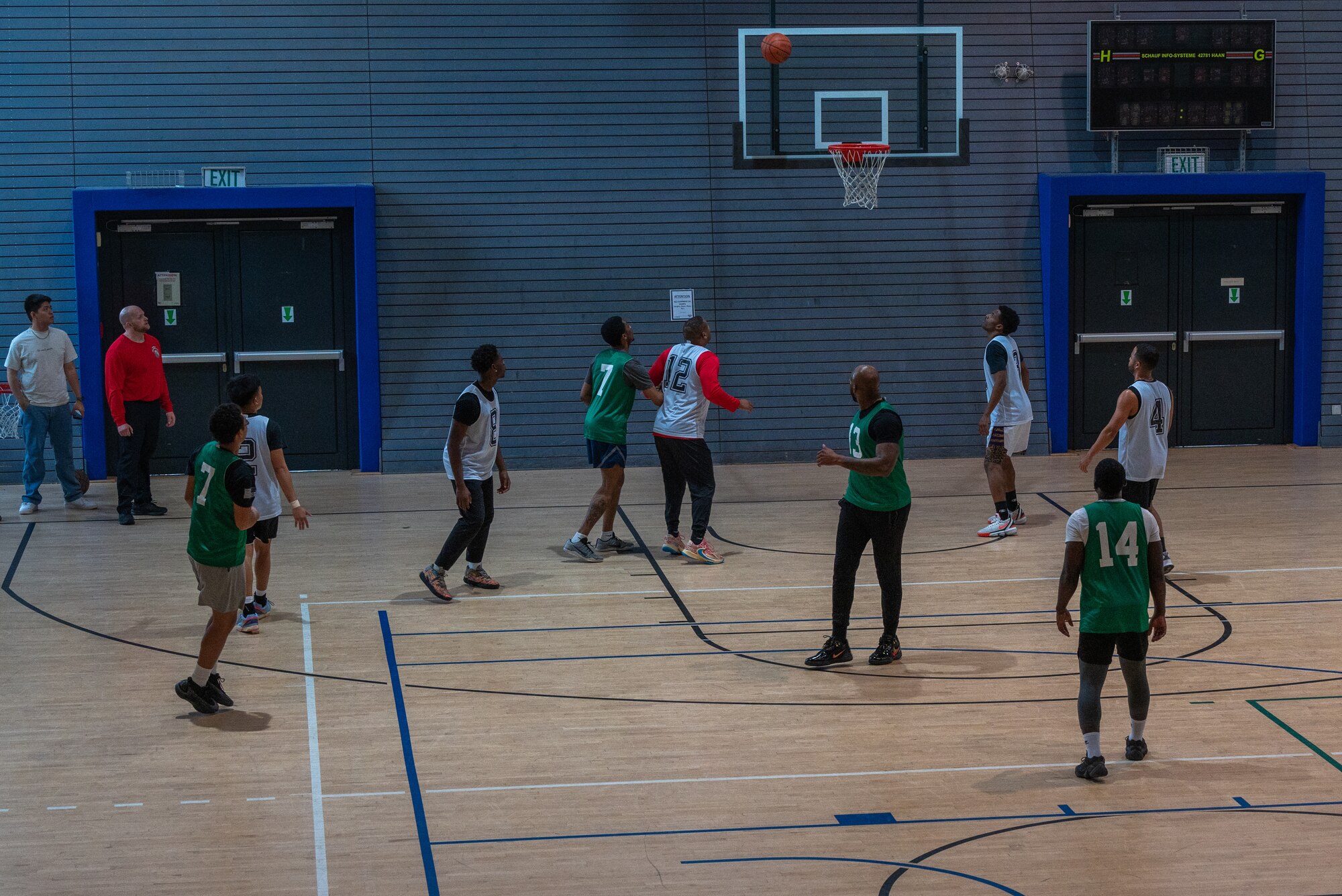 People play a basketball game