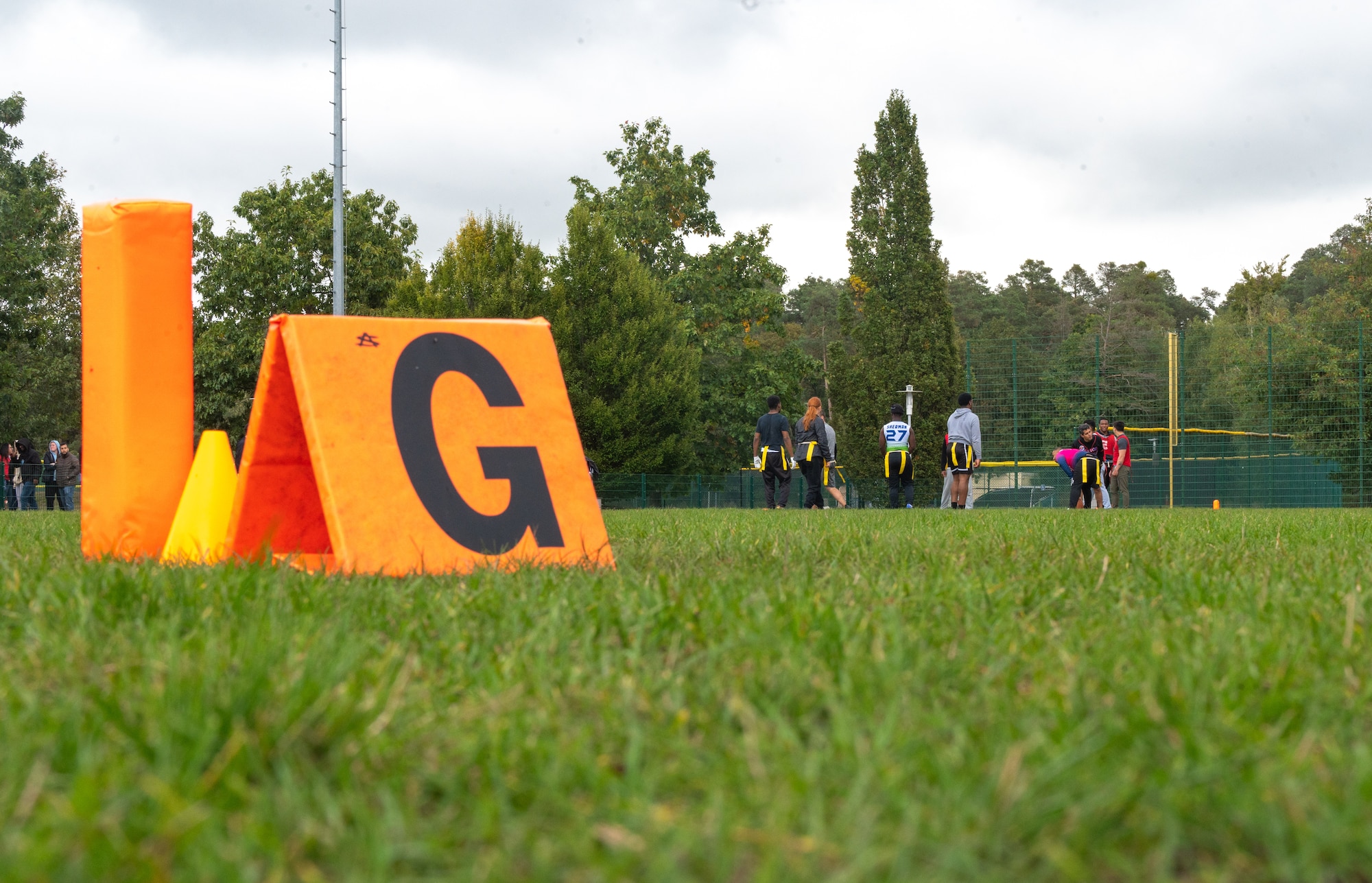 People play a football game