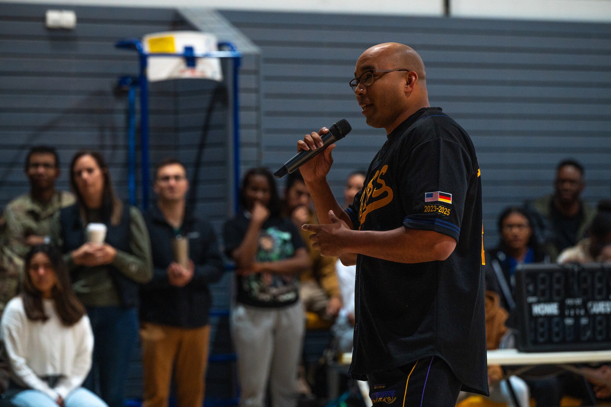 A man speaks into a microphone