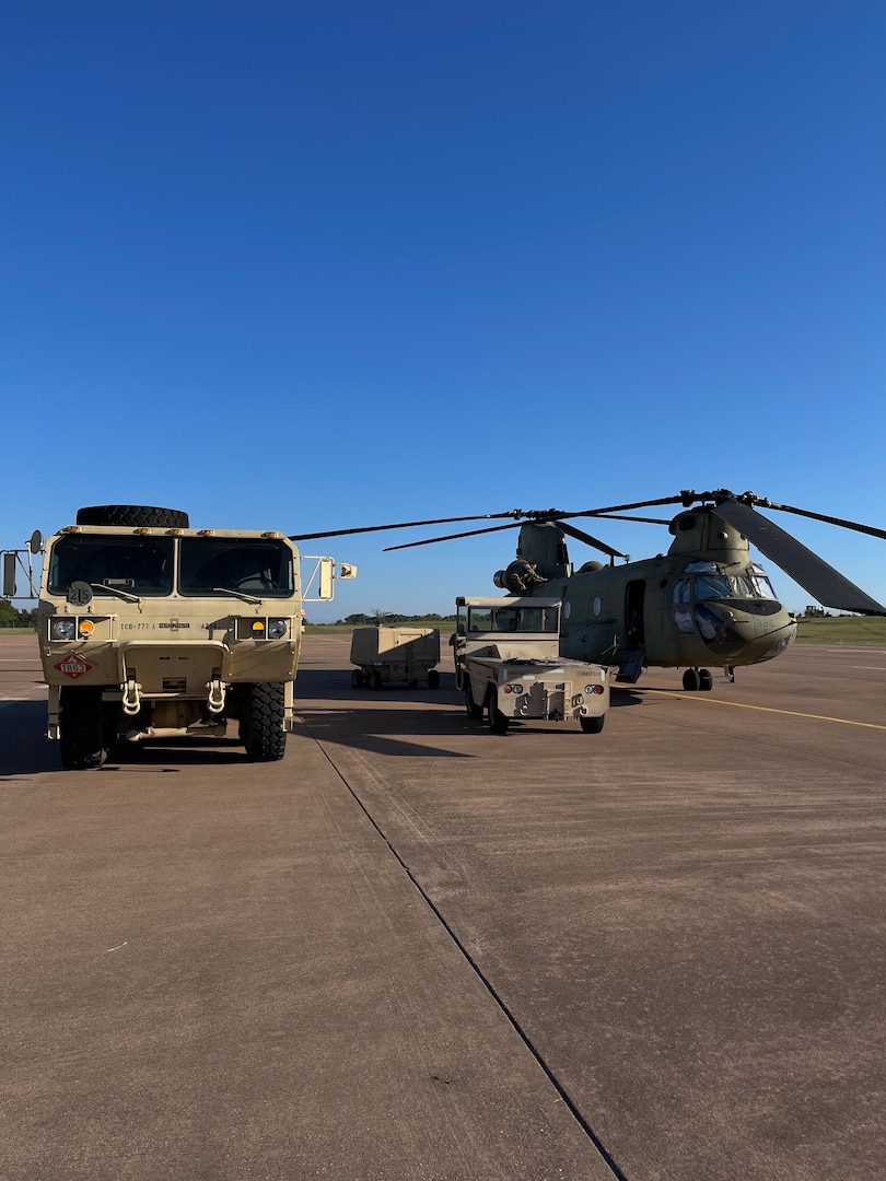 An Oklahoma Army National Guard CH-47 Chinook is readied by Oklahoma National Guard members at the OKARNG Aviation Support Facility in Lexington, Oklahoma on Oct. 6 before deploying to South Carolina in support of Hurricane Helene relief efforts.

At the direction of the Oklahoma Department of Emergency Management and with approval from Governor Kevin Stitt, the Oklahoma National Guard is supporting Hurricane Helene relief efforts in South Carolina. 

The North Carolina Department of Emergency Management submitted, through the Emergency Management Assistance Compact (EMAC), a request to Oklahoma for one CH-47 Chinook helicopter with hoist equipment and aircrew to support Task Force South in Greensville, South Carolina.  (Oklahoma National Guard photo by Staff Sgt. Ivan Diaz)