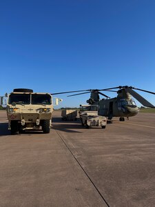 An Oklahoma Army National Guard CH-47 Chinook is readied by Oklahoma National Guard members at the OKARNG Aviation Support Facility in Lexington, Oklahoma on Oct. 6 before deploying to South Carolina in support of Hurricane Helene relief efforts.

At the direction of the Oklahoma Department of Emergency Management and with approval from Governor Kevin Stitt, the Oklahoma National Guard is supporting Hurricane Helene relief efforts in South Carolina. 

The North Carolina Department of Emergency Management submitted, through the Emergency Management Assistance Compact (EMAC), a request to Oklahoma for one CH-47 Chinook helicopter with hoist equipment and aircrew to support Task Force South in Greensville, South Carolina.  (Oklahoma National Guard photo by Staff Sgt. Ivan Diaz)