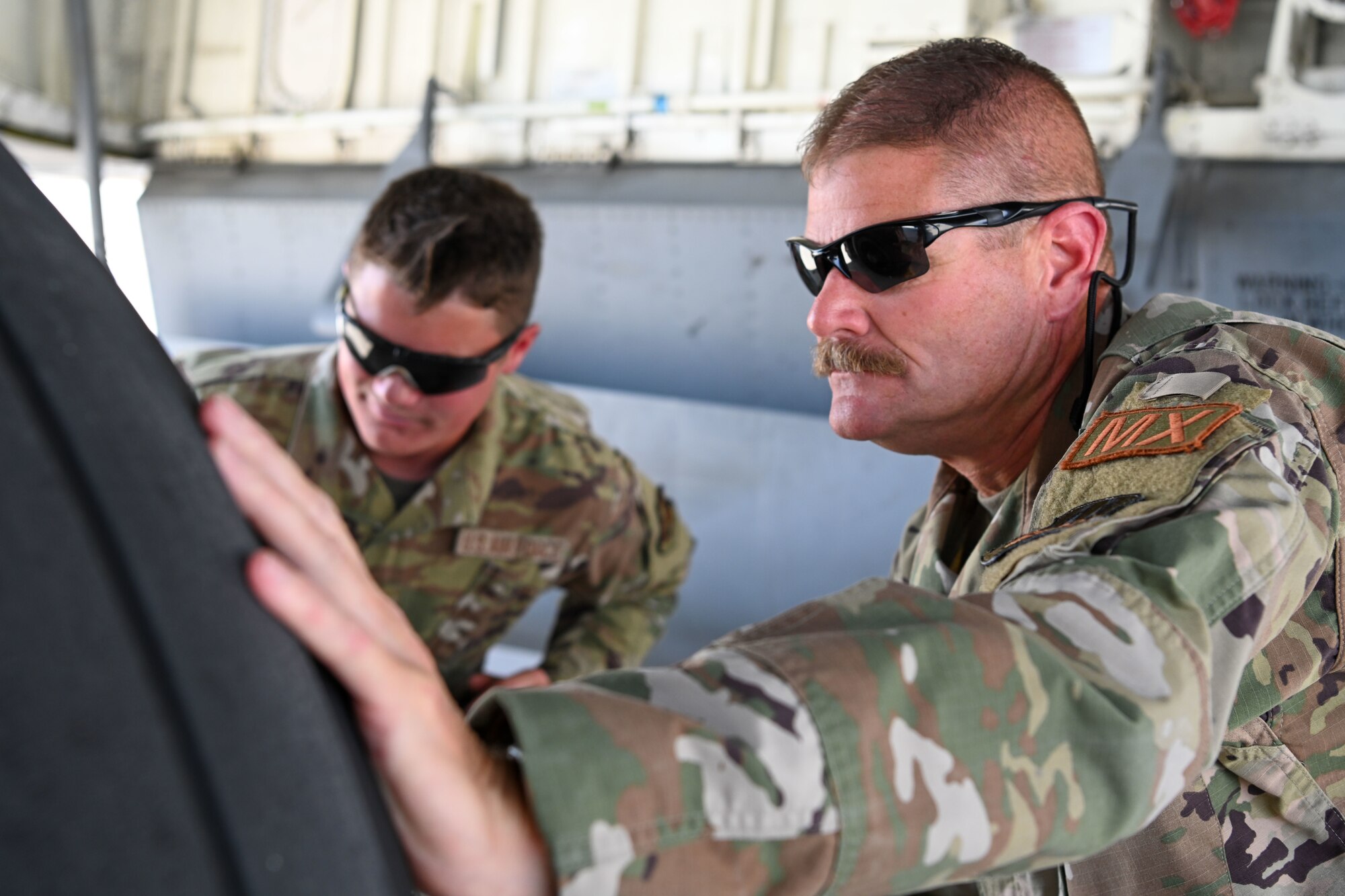 Father-son military duo work together