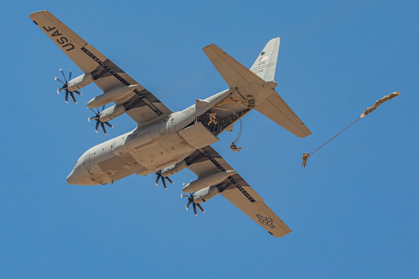 Paratroopers leap from a military aircraft over Morocco.