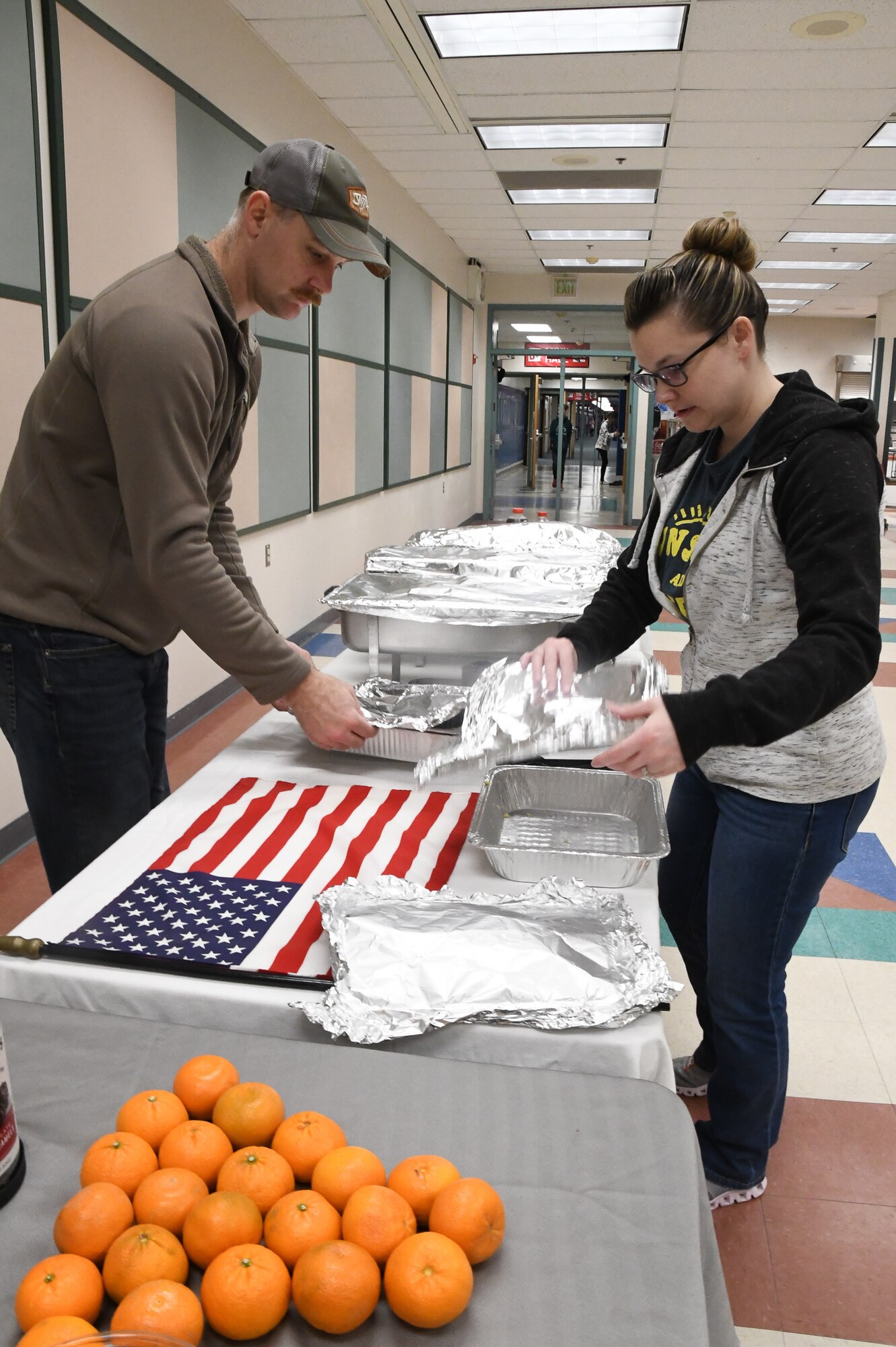 Members of the 168th Logistics Readiness Squadron prepare breakfast for military Veterans at a Veterans Day Breakfast community event hosted by Ben Eielson High School, Eielson Air Force Base Alaska, Nov. 10, 2022.