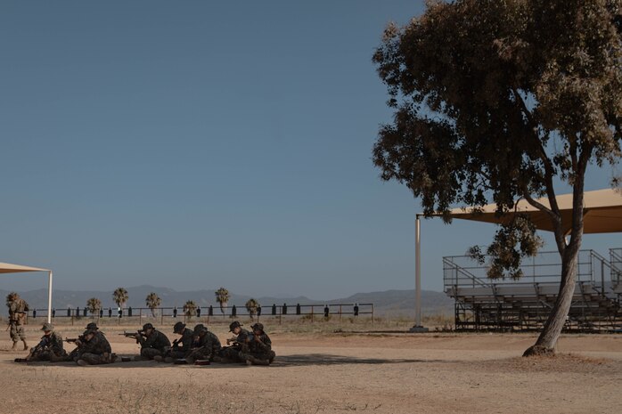 U.S. Marine Corps recruits with Bravo Company, 1st Recruit Training Battalion, sight in with their rifles during a grass week event at Marine Corps Base Camp Pendleton, California, Sept. 4, 2024. Recruits participated in grass week to hone their marksmanship skills by getting adjusted to their rifle’s equipment and sighting in on mock targets before moving on to the range for rifle qualification. (U.S. Marine Corps photo by Cpl. Elliott A. Flood-Johnson)