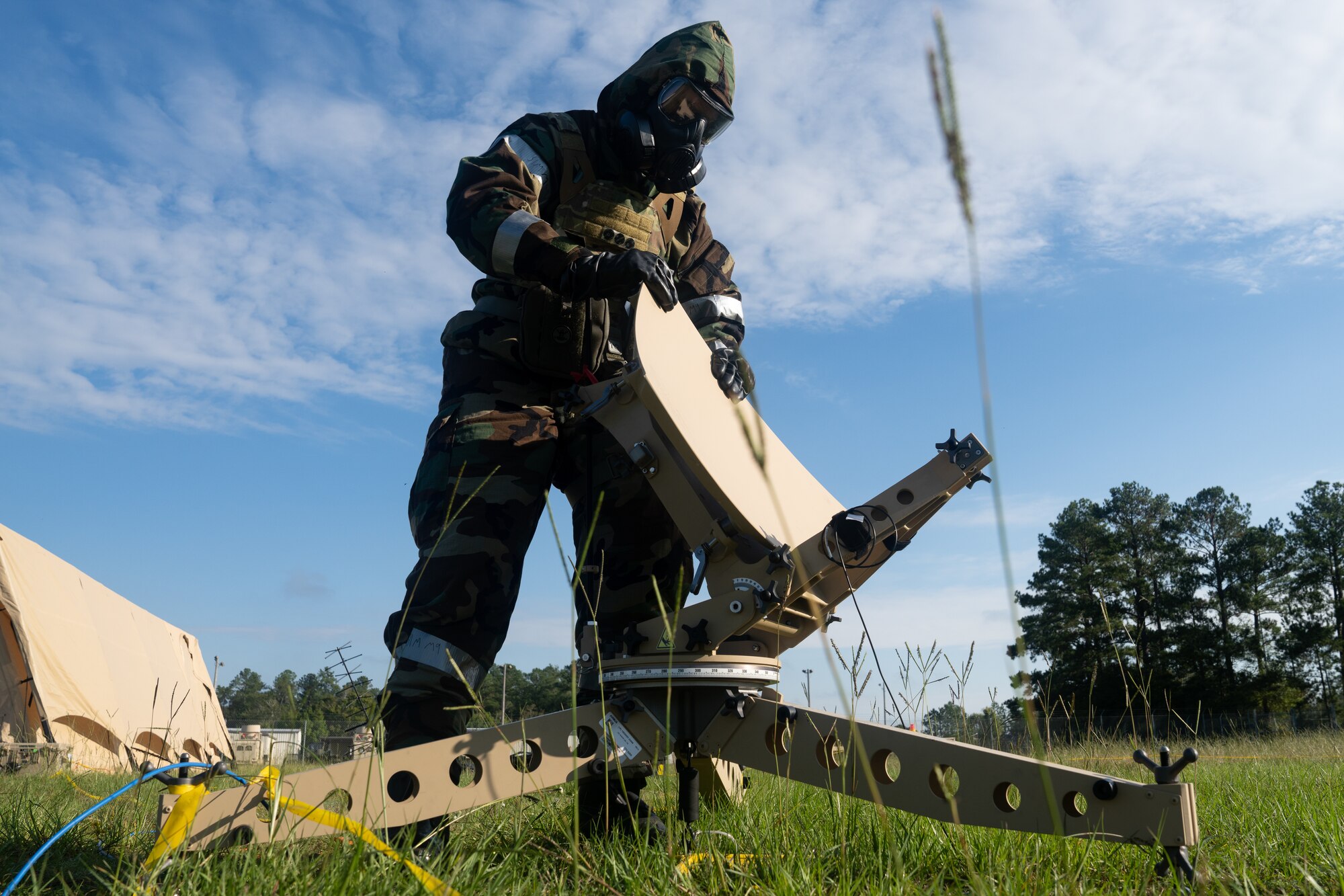An Airman breaks down communications equipment