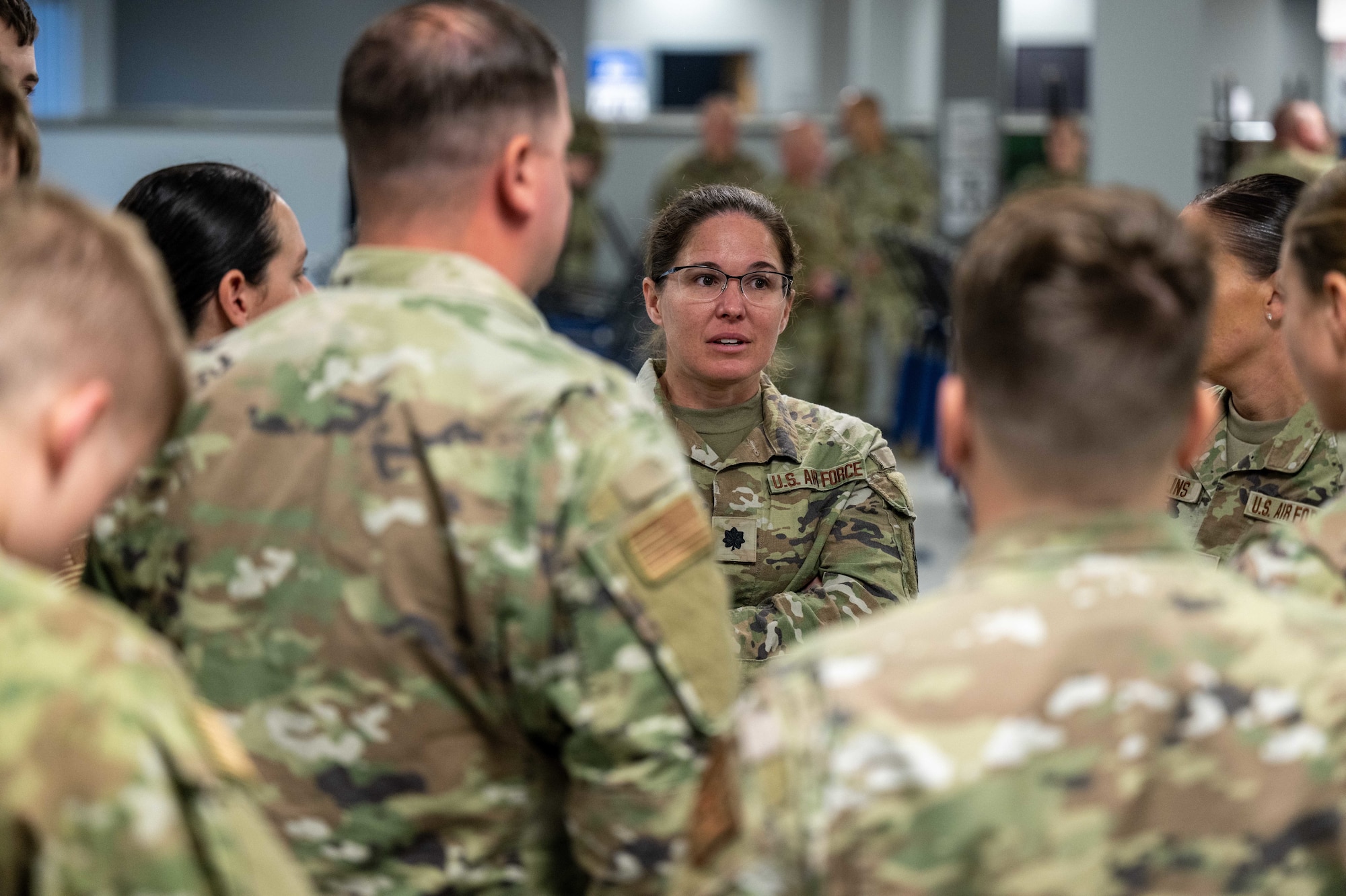 Lieutenant Colonel Anna Sherrod, Commander of the 130th Airlift Wing’s Force Support Squadron, briefs members of the FSRT before the day’s larger meeting. Fatality Search and Rescue Teams (FSRT) are multi-capable airmen trained and certified to respond to a wide range of disasters and hazards, recover the remains of the deceased, and reunite the remains
of those lost with their loved ones. (U.S. Air National Guard photo by 2nd Lt. De-Juan Haley)