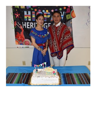 HM3 Lexie Sutton and HM3 Jefferson Arpi Ordonez, from NMRLC NORA Yorktown, are garbed in traditional Hispanic dress honoring the rich heritage to represent the culture and contributions of Hispanic and Latino Americans during this month's celebration.