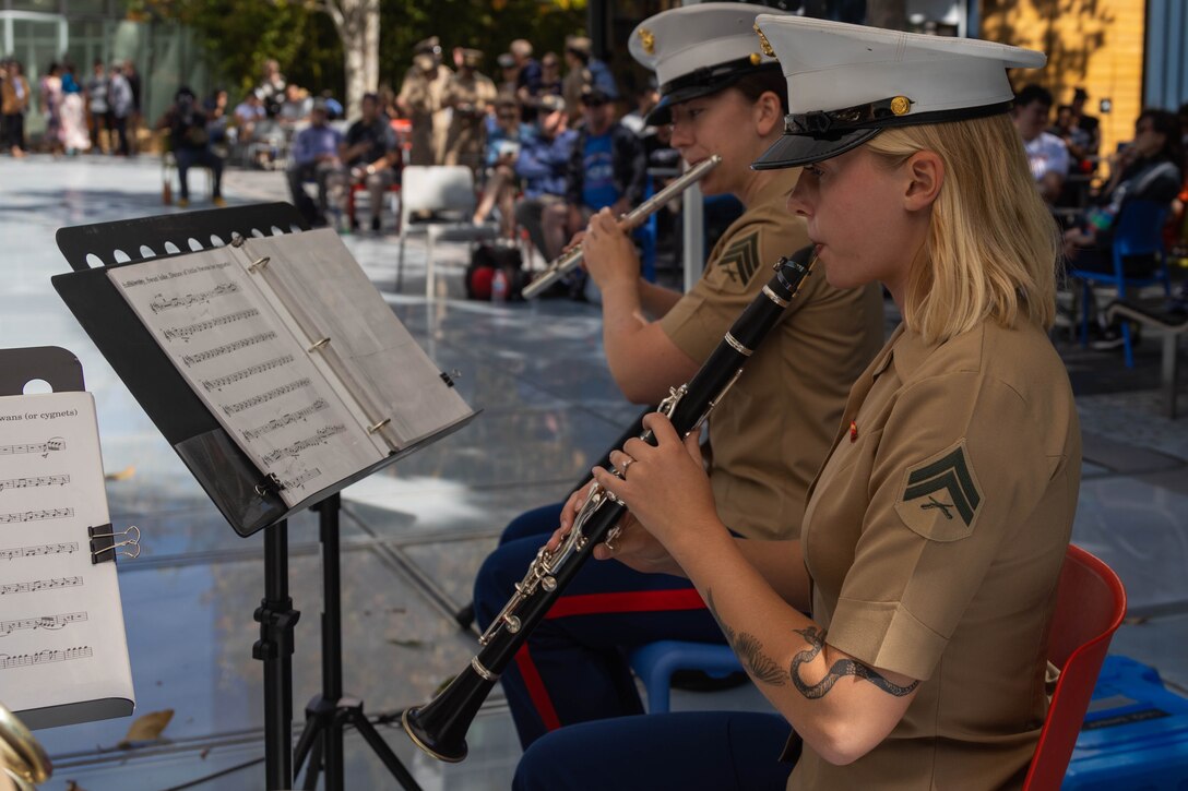U.S. Marine Corps Sgt. Renee Reid, left, and Cpl. Ava Perry, both instrumentalists with 1st Marine Division Band, perform at Salesforce Park Amphitheater as part of San Francisco Fleet Week 2024 in San Francisco, Oct. 8, 2024. SFFW, now in its 43rd iteration, is a time-honored sea service celebration that allows citizens of the Bay Area to witness today’s maritime capabilities firsthand. Nearly 2,500 Sailors, Marines, and Coast Guardsmen will showcase their capabilities and equipment, participate in various community service events, and enjoy the hospitality of the Bay Area during the event. (U.S. Marine Corps photo by Cpl. Bruin Largent)