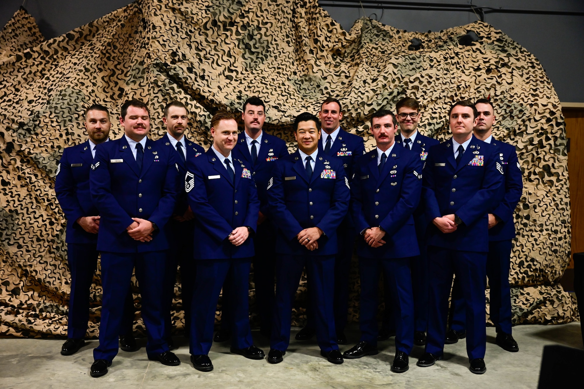 Members assigned to the 19th Civil Engineer Squadron poses for group picture