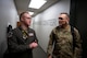 U.S. Air Force Capt. Shane Knowles, 91st Operations Support Squadron missileer (left), briefs Chief Master Sgt. Travis Chadick, Air Force Nuclear Weapons Center command chief, during a tour of the 91st Maintenance Group at Minot Air Force Base, North Dakota, Oct. 4, 2024. Chadick is the senior enlisted leader and primary adviser to the commander on all matters regarding the readiness, training and professional development of the Nuclear Weapons Center’s 2,000 Airmen. (U.S. Air Force photo by Airman 1st Class Luis Gomez)