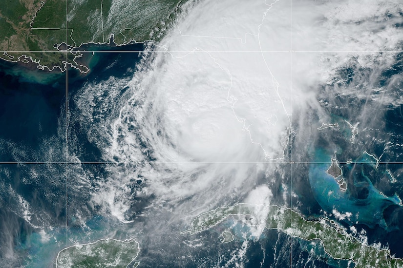 A satellite image of a hurricane next to the Florida panhandle.