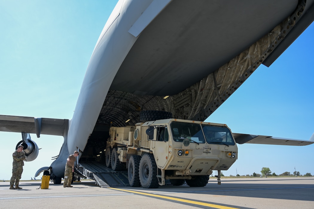 A Heavy Expanded Mobility Tactical Truck (HEMTT) backs into a C-17 Globemaster III aircraft at Altus Air Force Base, Oklahoma, Oct. 7, 2024. The key mission of the HEMTT is to provide heavy transport capabilities for the resupply of tactical vehicles and weapon systems. (U.S. Air Force photo by Airman 1st Class Lauren Torres)