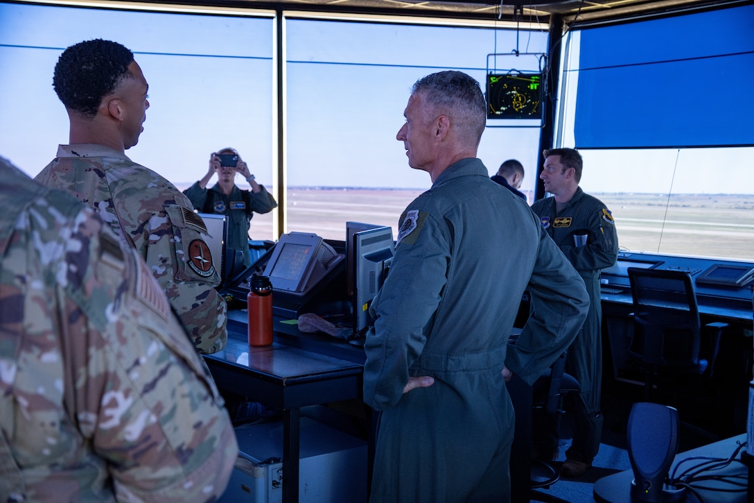 U.S. Air Force Maj. Gen. Gregory Kreuder, 19th Air Force commander, and Chief Master Sgt. Keith Scott