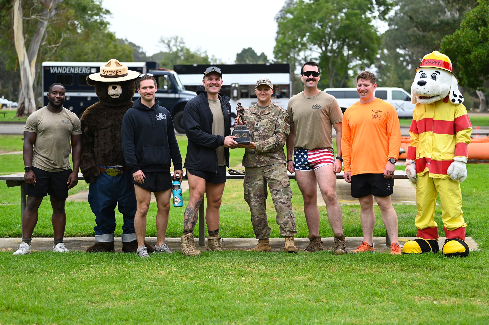 vandenberg base members participate in many events during a fire muster competition, events including pulling a truck, a water bucket challenge,
