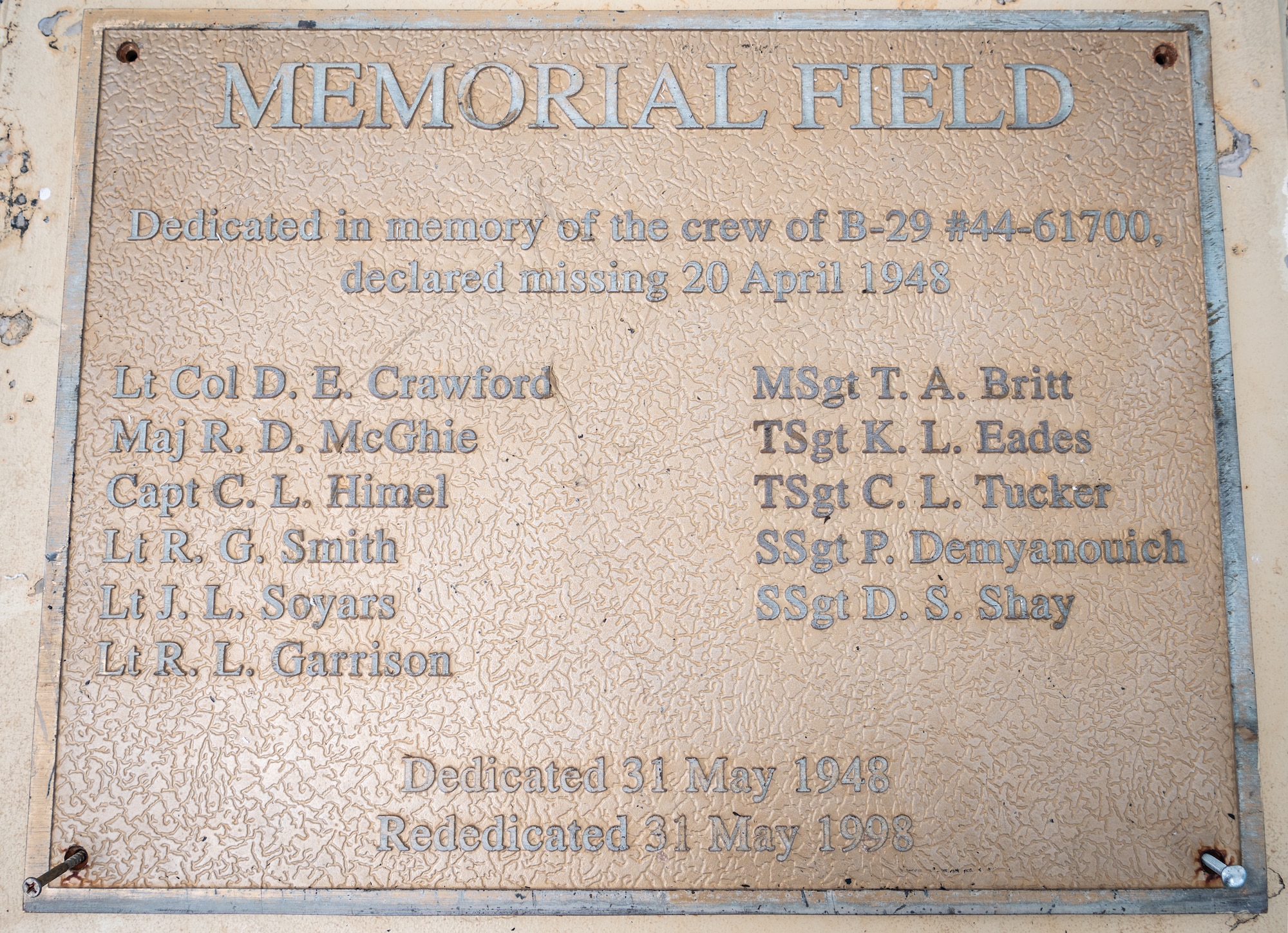 11 B-29 #4461700 crew members' names are listed on a brass plaque at Andersen Air Force Base, Guam, August 26, 2024. The crew went missing in 1948 after a routine training mission north of Guam. Andersen AFB dedicated a baseball field in their honor, both in 1948 and another rededication in 1998. (U.S. Air Force photo by Staff Sgt. Pedro Tenorio)