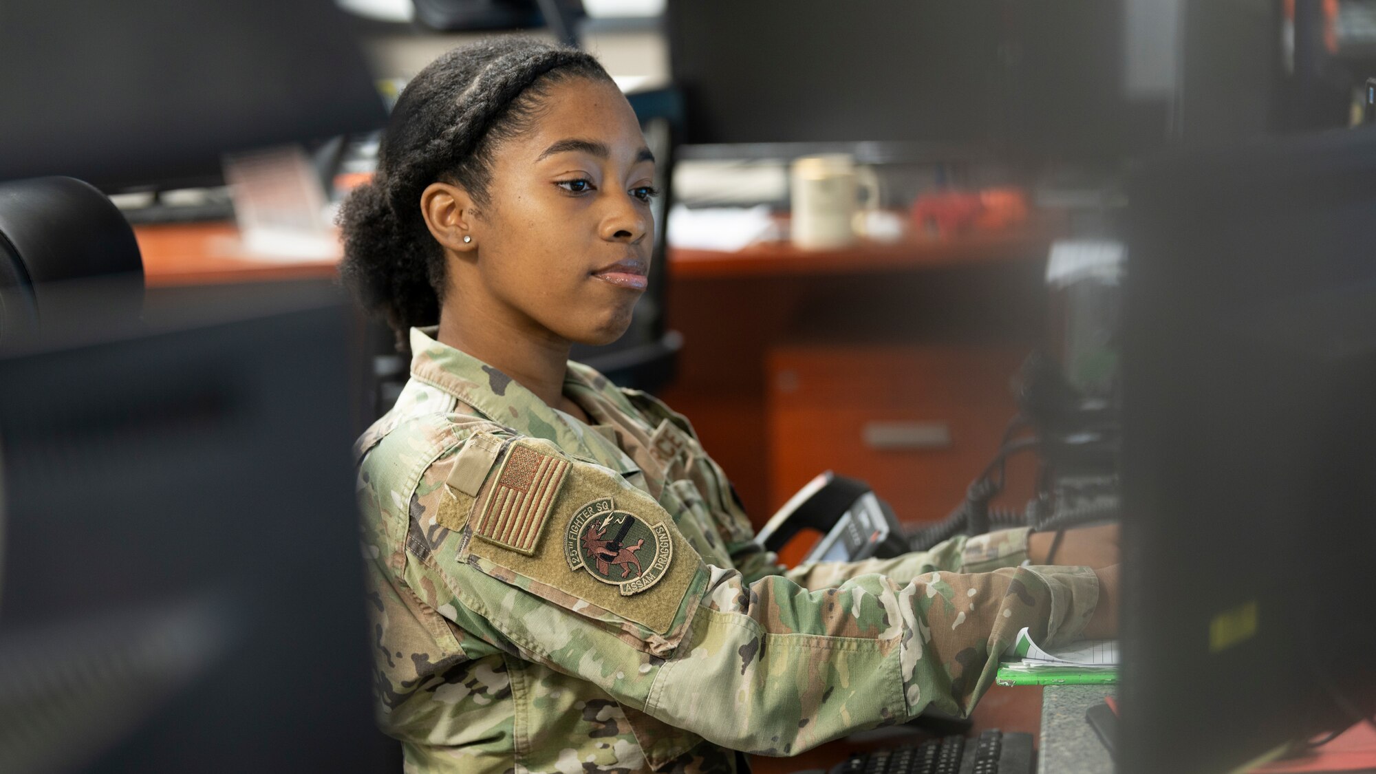 U.S. Air Force Senior Airman Erykah Moorer, 25th Fighter Squadron squadron aviation resource manager, records information on a log at Osan Air Base, Republic of Korea, Oct. 9, 2024. As a SARM, her job is to look over the aircrew’s training records and ensure they are “green” in all areas, effectively preventing possible mishaps while flying. Moorer was recognized as Mustang of the Week for her hard work and dedication to Team Osan. (U.S. Air Force photo by Staff Sgt. Ashley N. Mikaio)