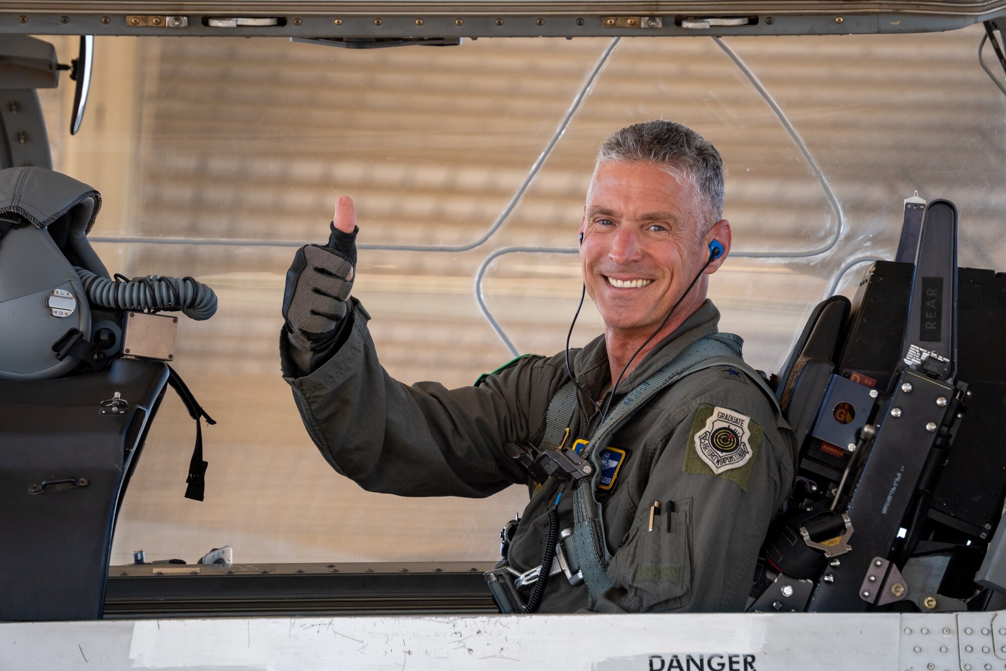 U.S. Air Force Maj. Gen. Gregory Kreuder, 19th Air Force commander, smiles in a T-6 Texan II