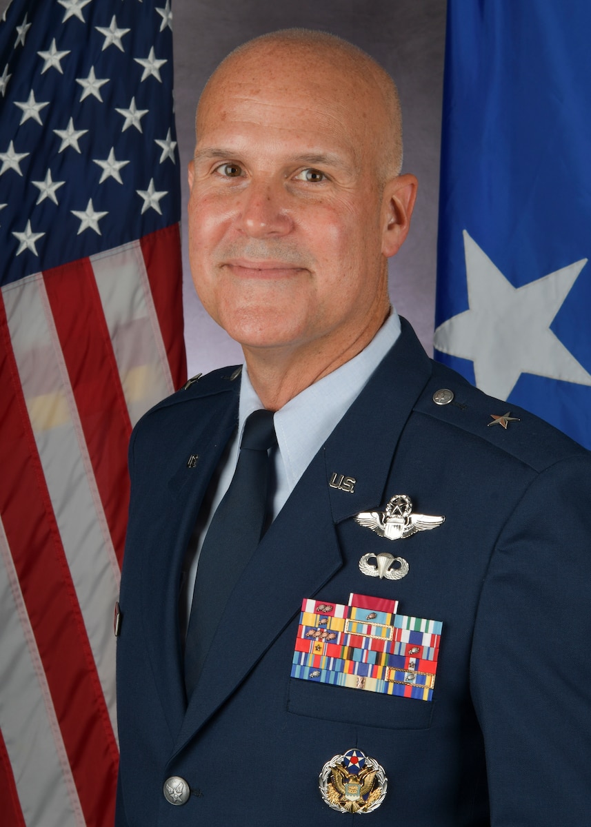 a man poses for a photo