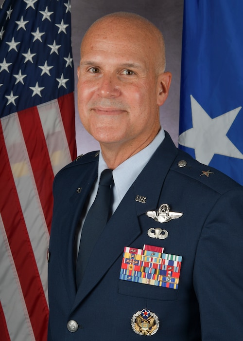 a man poses for a photo