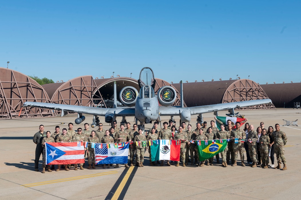 U.S. Air Force members assigned to the 51st Fighter Wing pose for a group photo for National Hispanic Heritage Month at Osan Air Base, Republic of Korea, Oct. 4, 2024. National Hispanic Heritage Month is observed each year from Sept. 15 – Oct. 15. As of 2020, 15.6% of the active-duty Air Force members are of Hispanic or Latino descent. (U.S. Air Force photo by Senior Airman Kaitlin Frazier)