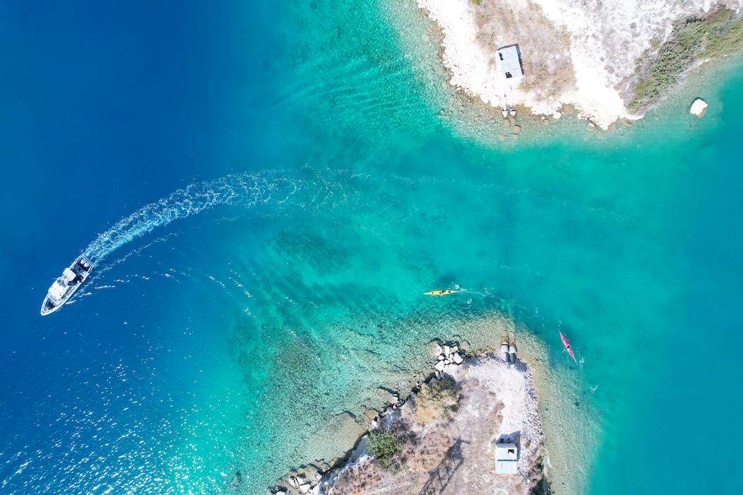 Competitors affiliated with Navy Support Activity (NSA) Souda Bay, NATO and Hellenic armed forces take part in a 4-kilometer kayak as part of the 21st Eco-Challenge event hosted by NSA Souda Bay and organized and executed by the Morale, Welfare and Recreation team on Oct 5, 2024.