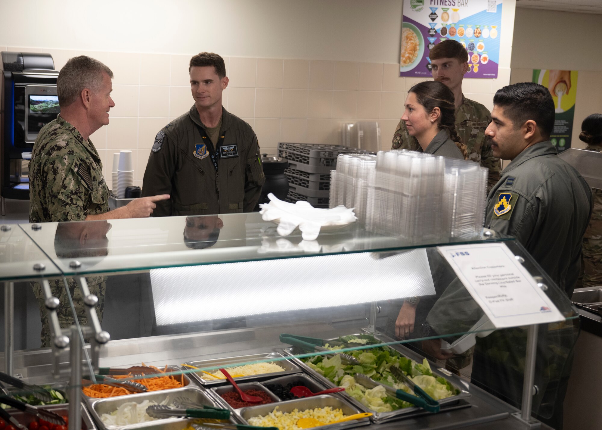 U.S. Navy Adm. Samuel J. Paparo, U.S. Indo-Pacific Command commander, and Lt. Gen. David Iverson, 7th Air Force commander, speaks with Airmen during a troop engagement.