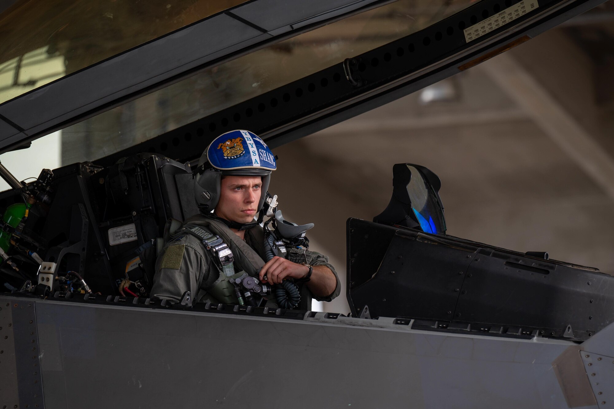 U.S. Air Force Capt. Jacob Heydinger, 525th Expeditionary Fighter Squadron pilot, prepares for a flight on a F-22A Raptor at Kadena Air Base, Japan, Oct. 10, 2024.