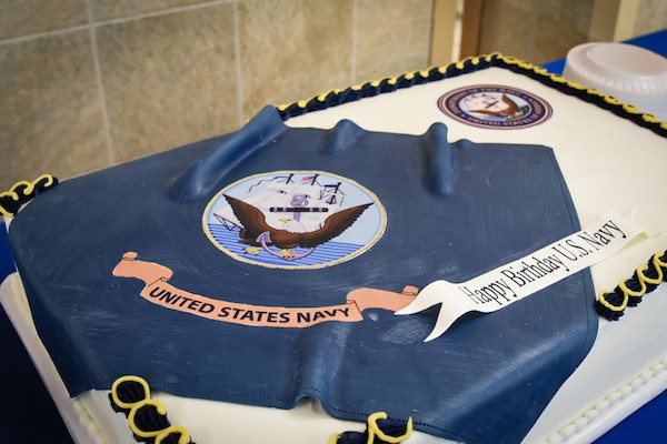 Sailors, Marines and civilians serving aboard Marine Corps Air Station Cherry Point celebrated the 249th Birthday of the United States Navy with a cake cutting ceremony at the base dining facility Wednesday, October 9.