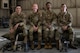 Airmen assigned to the 23rd Bomber Generation Squadron pose for a group photo before taking part in the third-quarter load competition at Minot Air Force Base, Oct. 4, 2024. The load competition is held quarterly and ensures Operational readiness. (U.S. Air Force photo by Airman 1st Class Wesley Davies)