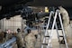 Airmen assigned to the 23rd Bomber Generation Squadron attach an inert GBU-31 to the underside of a B-52H Stratofortress wing at Minot Air Force Base, Oct. 4, 2024. In order to load the inert GBU-31 onto the aircraft, two Airmen are needed to attach it to the aircraft while another supervises to ensure safety. (U.S. Air Force photo by Airman 1st Class Wesley Davies)