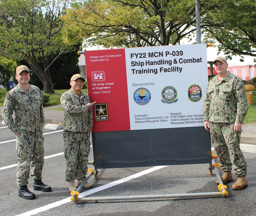 YOKOSUKA, Japan (Oct. 07, 2024) After participating in a groundbreaking ceremony at the site of the P-39 Ship Handling and Combat Training Facility onboard Commander, Fleet Activities Yokosuka, Surface Combat Systems Training Command (SCSTC) Western Pacific’s leadership pose for a group photo, Oct 7.  The Ship Handling and Combat Training Facility is planned to be a multi-story building to include high bay space for Integrated Navigation, Seamanship and Ship Handling Trainers, a Radar Navigation Trainer, a Multi-Purpose Reconfigurable Training System, and SCSTC’s Combined Integrated Air and Missile Defense (IAMD) Anti-Submarine Warfare (ASW) Trainer (CIAT).  The CIAT, the third of its kind, will join existing CIATs in San Diego, California and Norfolk, Virginia, which have proven instrumental in enhancing mission readiness. (U.S. Navy photo)