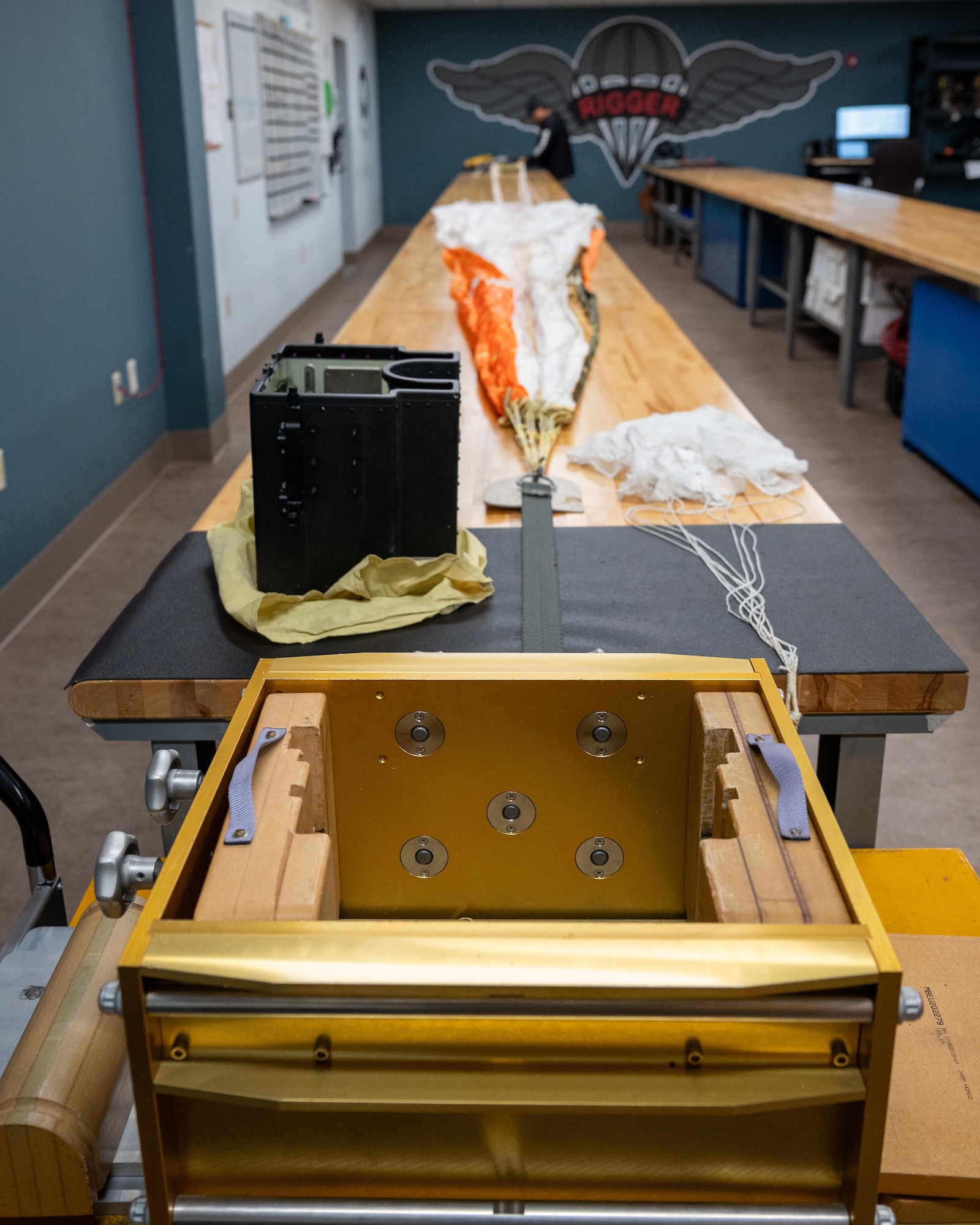 A parachute at the parachute shop is ready to be inspected and repacked at Laughlin Air Force Base, Texas, Oct. 3, 2024. The parachute shop, part of the aircrew flight equipment, is essential in ensuring pilots are reassured that if anything goes wrong with their aircraft, they can safely eject. (U.S. Air Force photo by Staff Sgt. Nicholas Larsen)