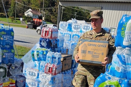 Virginia National Guard Soldiers assigned to the Cedar Bluff-based 1033rd Engineer Company, 276th Engineer Battalion, 329th Regional Support Group, assist with food and water distribution Oct. 5-6, 2024, in Damascus, Virginia. Approximately 20 1033rd Soldiers with tactical trucks capable of high-mobility transportation are staged in Abingdon to support the response to Hurricane Helene.