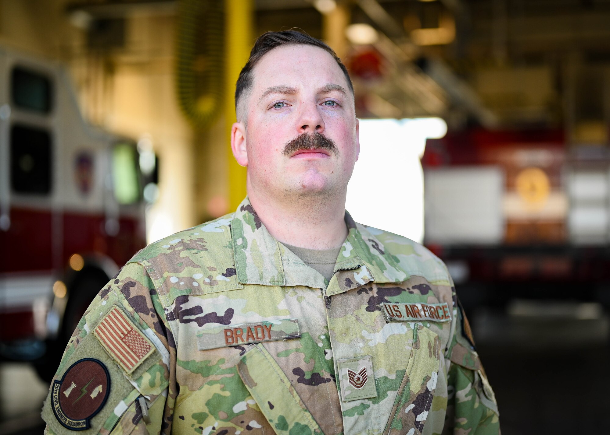 A firefighter poses for a photo.