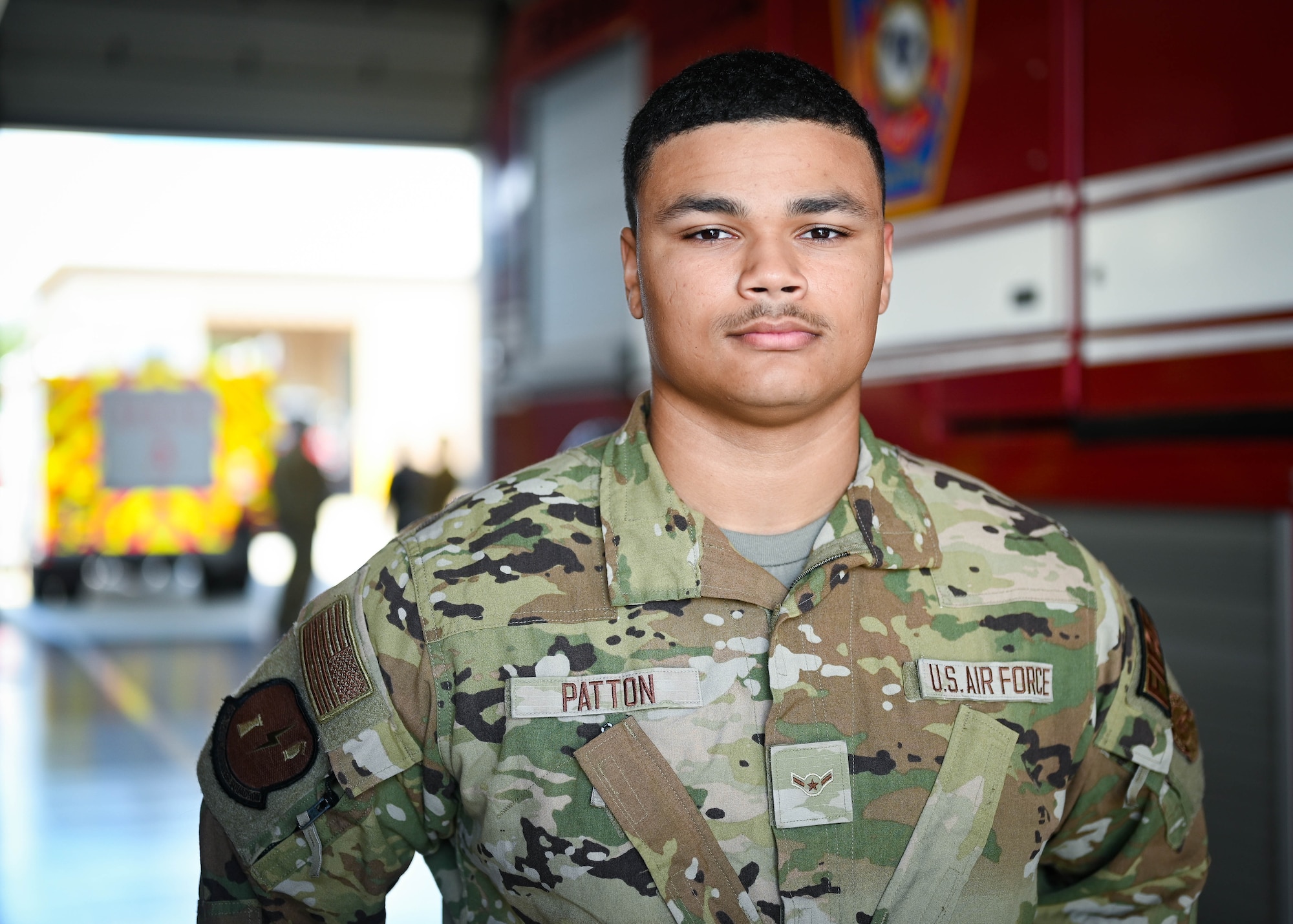 An Airman poses for a photo.