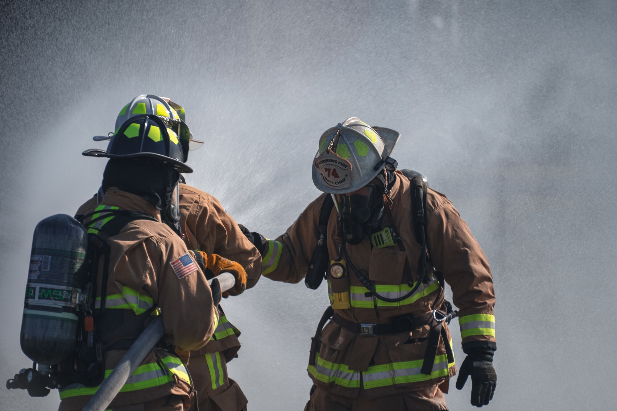 Firefighters use fire hose