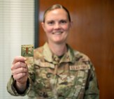 An Airman poses for a photo.