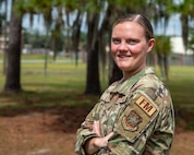 An Airman poses for a photo.
