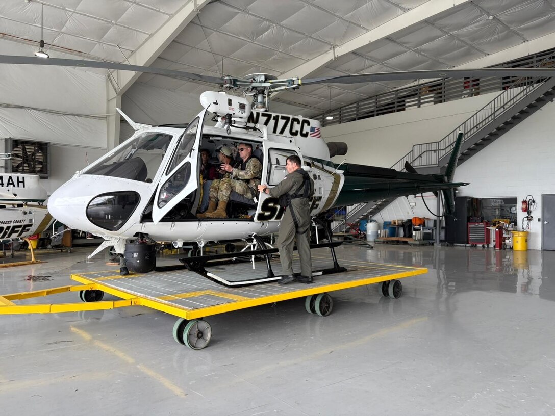USACE Commander being shown one of the aircraft staged to respond to Hurricane Milton.