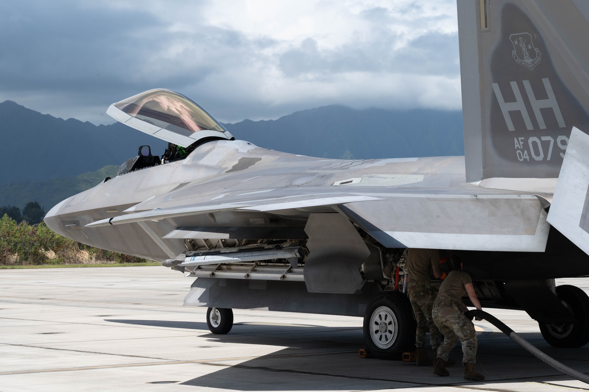 U.S. Air Force Airmen refuel an F-22 Raptor aircraft.
