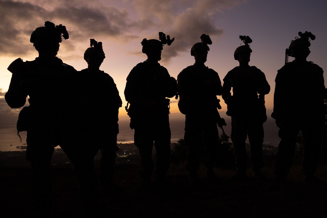 U.S. Marines from C Company, 3rd Littoral Combat Team, 3rd Marine Division, prepare to execute a night raid exercise in Tahiti, French Polynesia, Aug. 31, 2024. The event provided an opportunity for U.S. Marines to foster a deeper understanding of French military equipment while contributing towards building mutual respect of our Allies and partners within the Indo-Pacific region. (U.S. Marine Corps photo by Lance Cpl. Jose Villasenor)