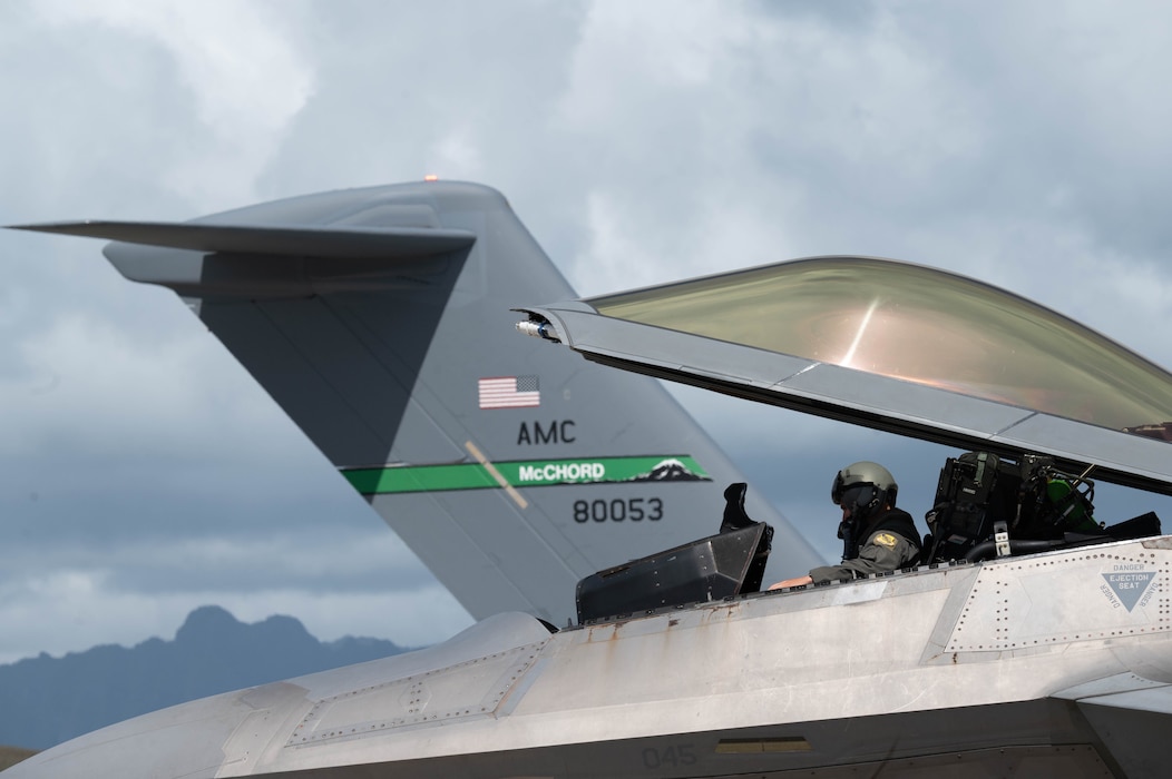 U.S. Air Force Capt. Brandon Jones, 199th Fighter Squadron pilot, exits a F-22 Raptor for refueling for exercise Joint Pacific Multinational Readiness Center 25-01 on Marine Corps Base Hawaii Oct. 9, 2024. The Joint Pacific Multinational Readiness Center (JPMRC) is the Army’s newest Combat Training Center (CTC) and generates readiness in the environments and conditions where our forces are most likely to operate in. JPMRC 25-01 includes training participants from across the U.S. Joint Force, and multinational Allies and partners. (U.S. Air Force photo by Airman 1st Class Aden Brown)