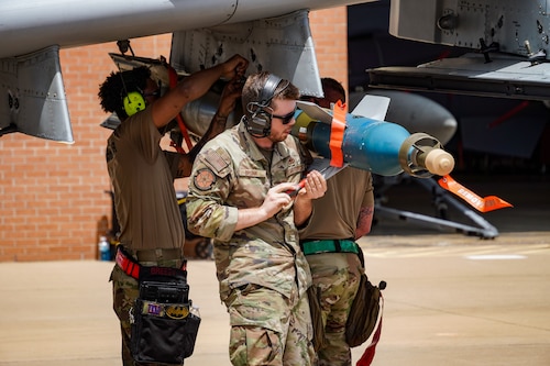 Staff Sgt. Victor Brunk works with Airmen in Training to install CCG onto an A-10 during a BRACER FORGE demonstration to implement hands-on training.