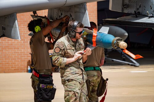 Staff Sgt. Victor Brunk works with Airmen in Training to install CCG onto an A-10 during a BRACER FORGE demonstration to implement hands-on training.