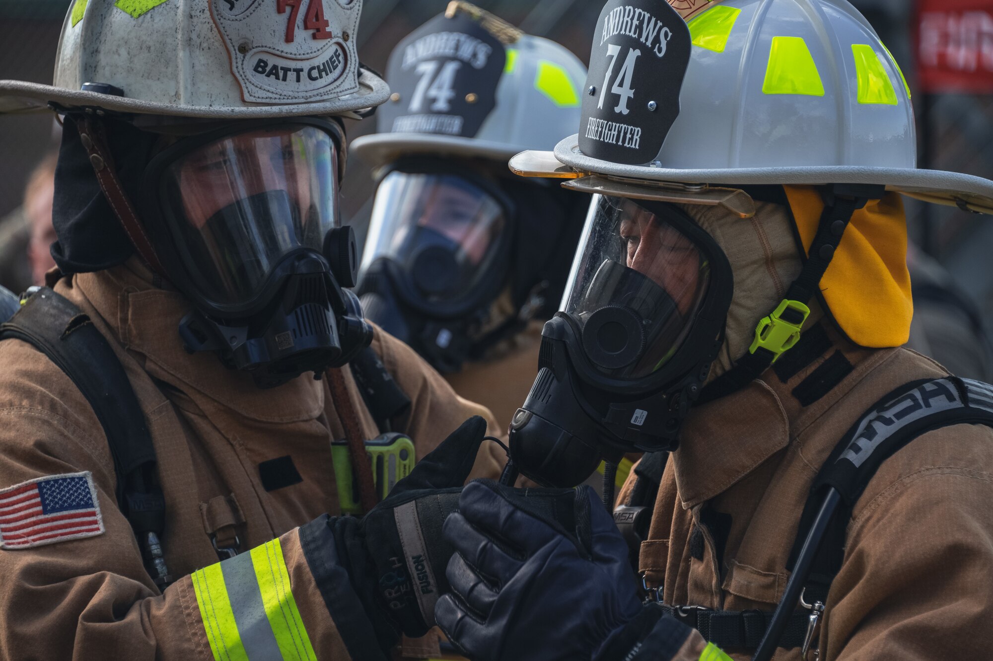 Firefighters fix masks
