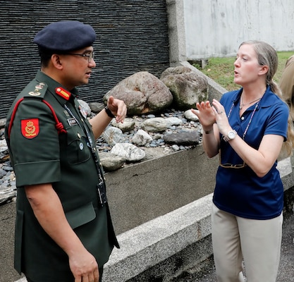 KUALA LUMPUR, Malaysia (July 19, 2024) Brig. Gen. Mohd Arshil Moideen, dean of the National Defense University of Malaysia’s medical facility and defense health division, speaks with Lt. Cmdr. Dawn Weir, director of Naval Medical Research Unit (NAMRU) INDO PACIFIC’s Malaysia detachment during an official visit. Part of Navy Medicine Research & Development and headquartered out of Singapore, NAMRU INDO PACIFIC conducts research in cooperation with host nations in Vietnam, Laos, Singapore, Malaysia and Thailand to improve global health, ensure military force health protection and address infectious diseases such as malaria, dengue fever virus and gastro-intestinal pathogens. (U.S. Navy photo by Tommy Lamkin /Released)