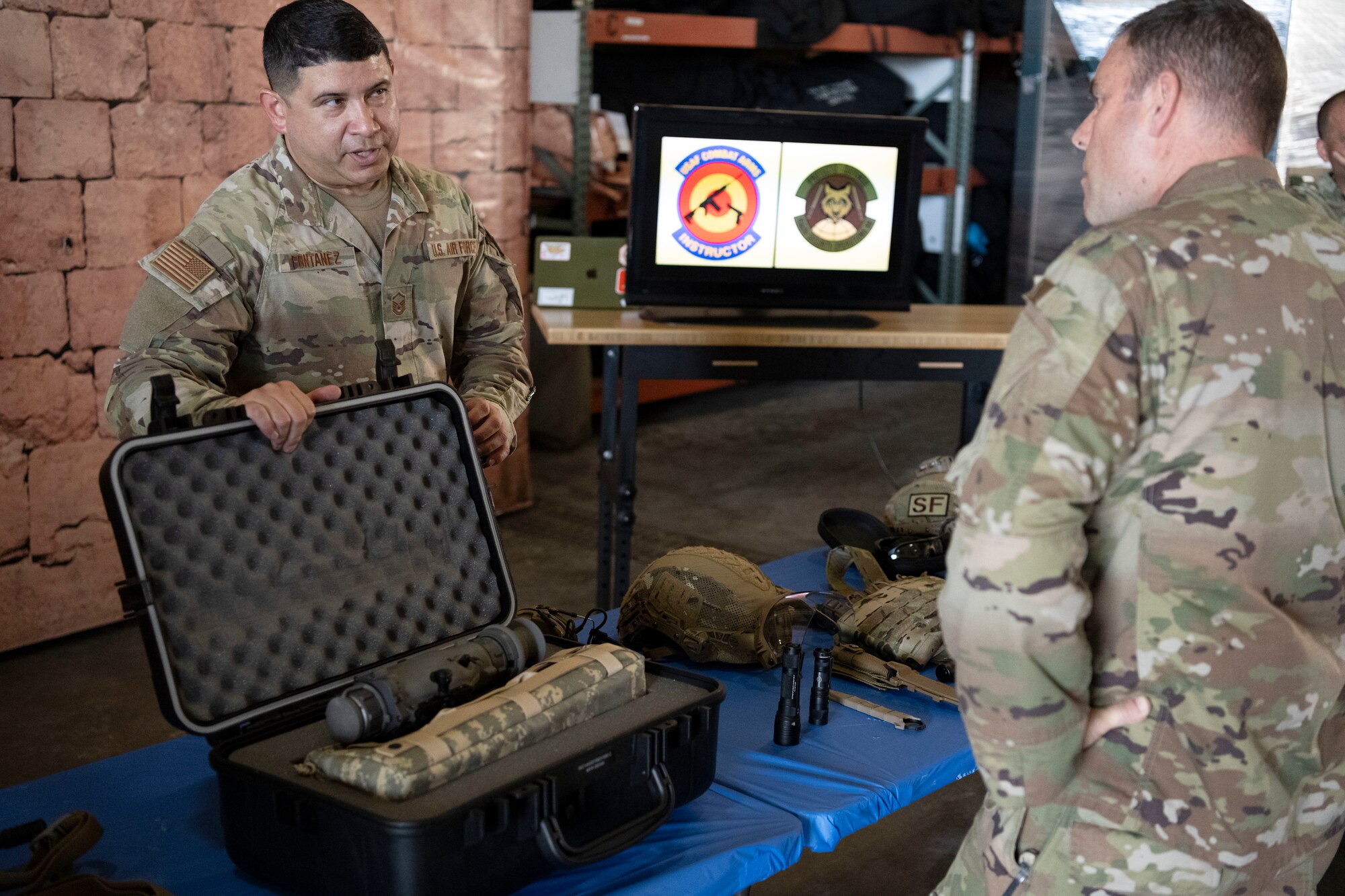 U.S. Air Force Master Sgt. Jose Fontanez, a security forces craftsman, with the 156th Security Operations Squadron, Puerto Rico Air National Guard, briefs leaders during the Contingency Response Senior Leadership Summit at Muñiz Air National Guard Base, Carolina, Puerto Rico, Oct. 9, 2024. The summit included a CR equipment and capability demonstration where subject matter experts engaged with leaders from 10 participating states and territories as well as retired Puerto Rico Air National Guard veterans, providing insight on the specialized equipment displayed necessary to conduct CR operations in disaster response and contested combat environments. (U.S. Air National Guard photo by Master Sgt. Victor J. Vazquez)