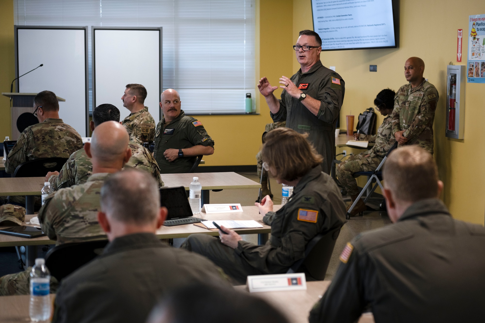 U.S. Air Force Col. Joelee Sessions, 182nd Air Support Operations Group commander, Illinois Air National Guard, briefs leaders during the Contingency Response Senior Leadership Summit at Muñiz Air National Guard Base, Carolina, Puerto Rico, Oct. 8, 2024. The first ever CR Summit brought together leaders from 10 participating states and territories to standardize how to better organize, train, and equip contingency response units across the Air National Guard enterprise focusing on expanding and enhancing CR global capabilities for future opportunities by exchanging best practices across the spectrum of air operations, from humanitarian disaster response to contested combat environments. (U.S. Air National Guard photo by Master Sgt. Victor J. Vazquez)