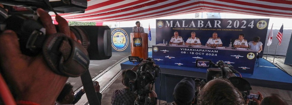 241009-N-UA460-1404 VISAKHAPATNAM, India (Oct. 9, 2024) Senior leaders from the Indian Navy, Japan Maritime Self-Defense Force (JMSDF), Royal Australian Navy and U.S. Navy answer questions from media during the opening ceremony for Exercise Malabar 2024 on board Indian Navy Submarine Base Virbahu in Visakhapatnam, India, Oct. 9, 2024. Malabar 24 is a combined field training exercise with the Royal Australian Navy, Indian Navy, JMSDF and U.S. Navy participants. The exercise is designed to support achievement of strategic objectives by strengthening partnerships in the Indo-Pacific and promoting interoperability in the conduct of complex warfighting operations. (U.S. Navy photo by Mass Communication Specialist 1st Class Greg Johnson)